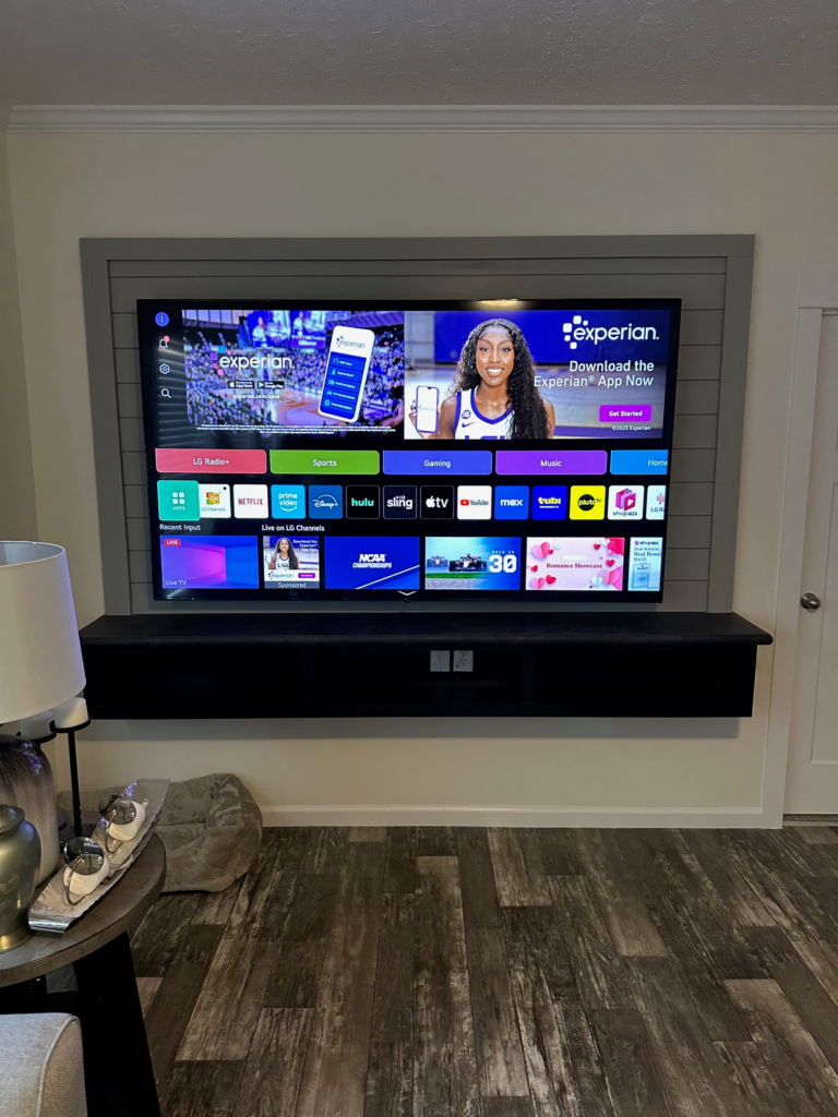 75" TV Mount on Floating Entertainment Center